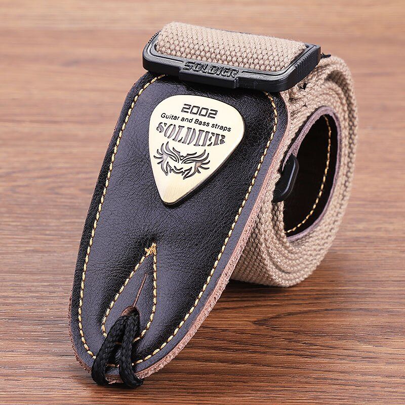 Classic electric guitar strap in khaki color with leather head.