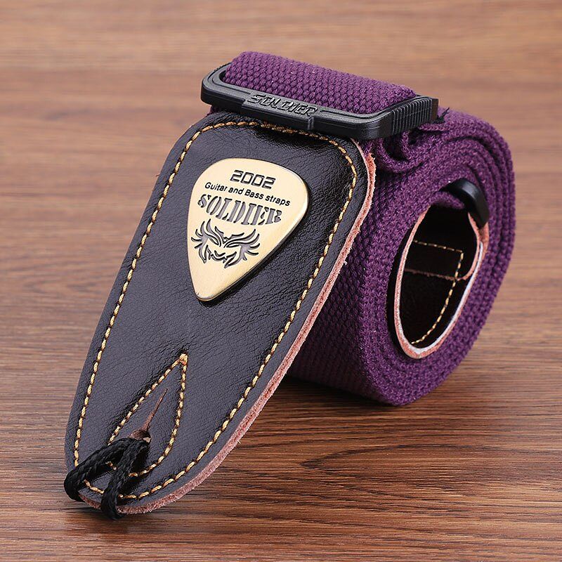 Classic electric guitar strap in violet color with leather head.