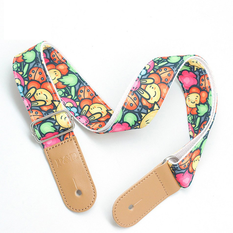 Child's guitar strap with rabbit and ladybug patterns