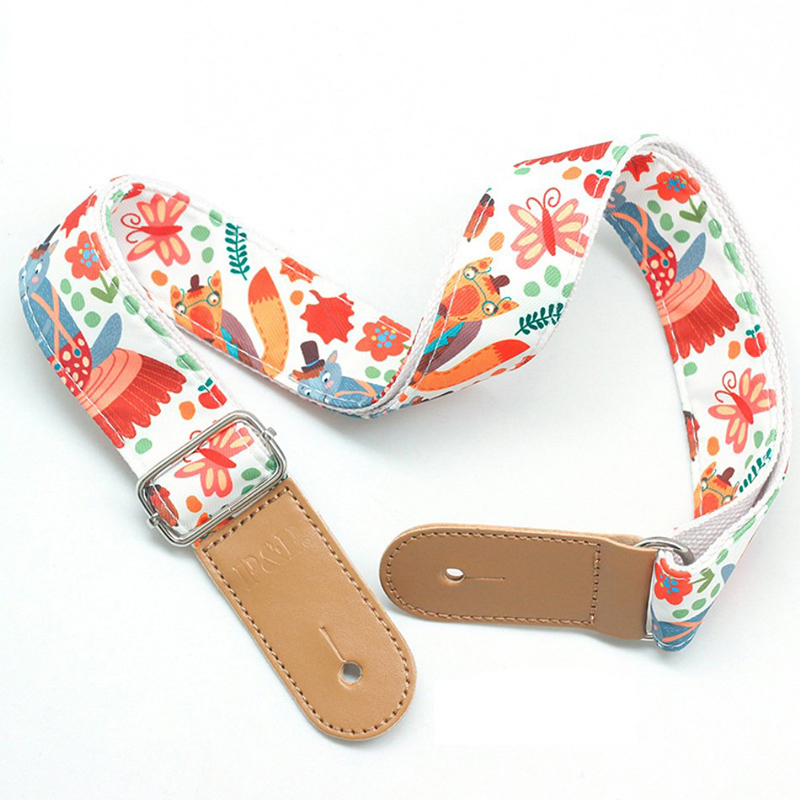 Child's guitar strap with fox and forest patterns