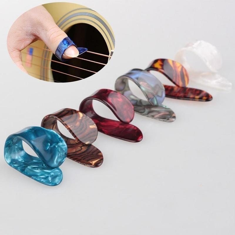 Set of 4 random colored thumb picks