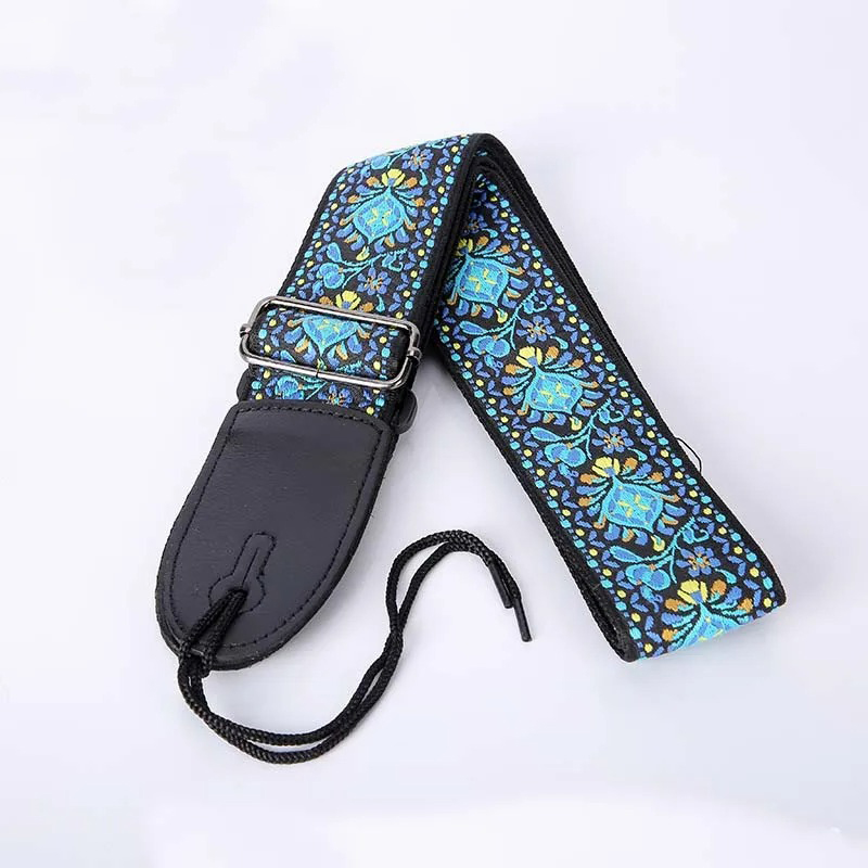 Fabric strap with a blue embroidered floral pattern