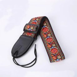 Fabric strap with a red embroidered floral pattern