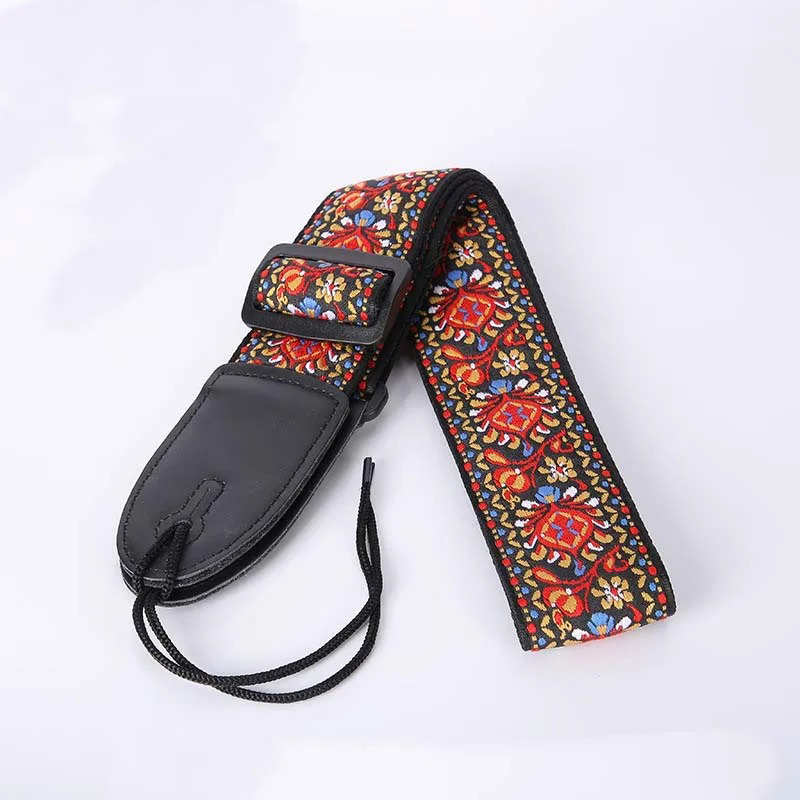 Fabric strap with a red embroidered floral pattern
