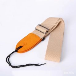 Beige-colored fabric guitar strap