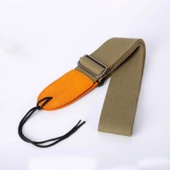 Khaki-colored fabric guitar strap
