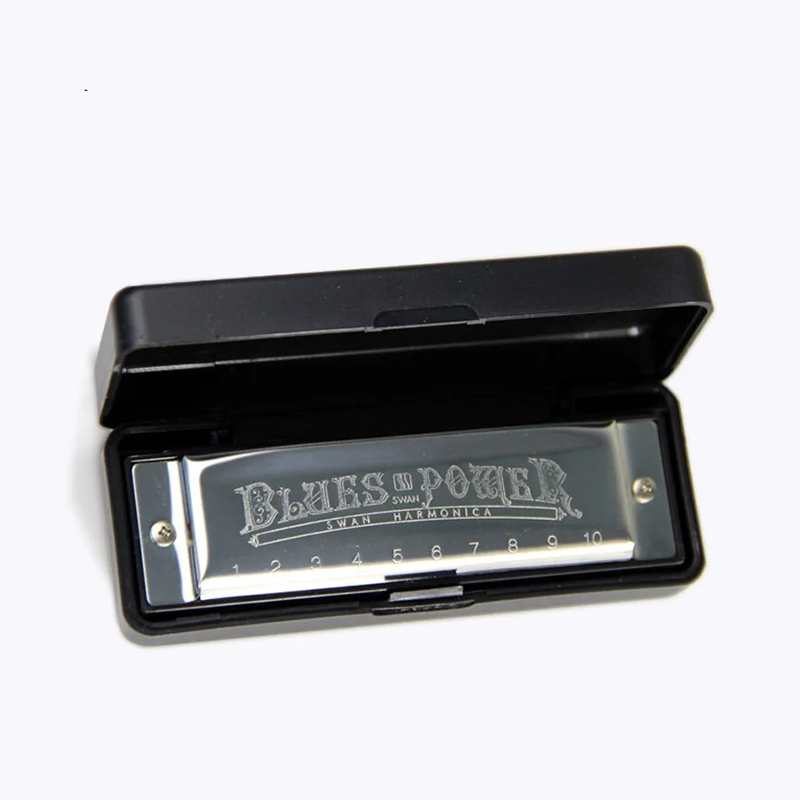 Full view of a blues design diatonic harmonica made of metal with a brass case.
