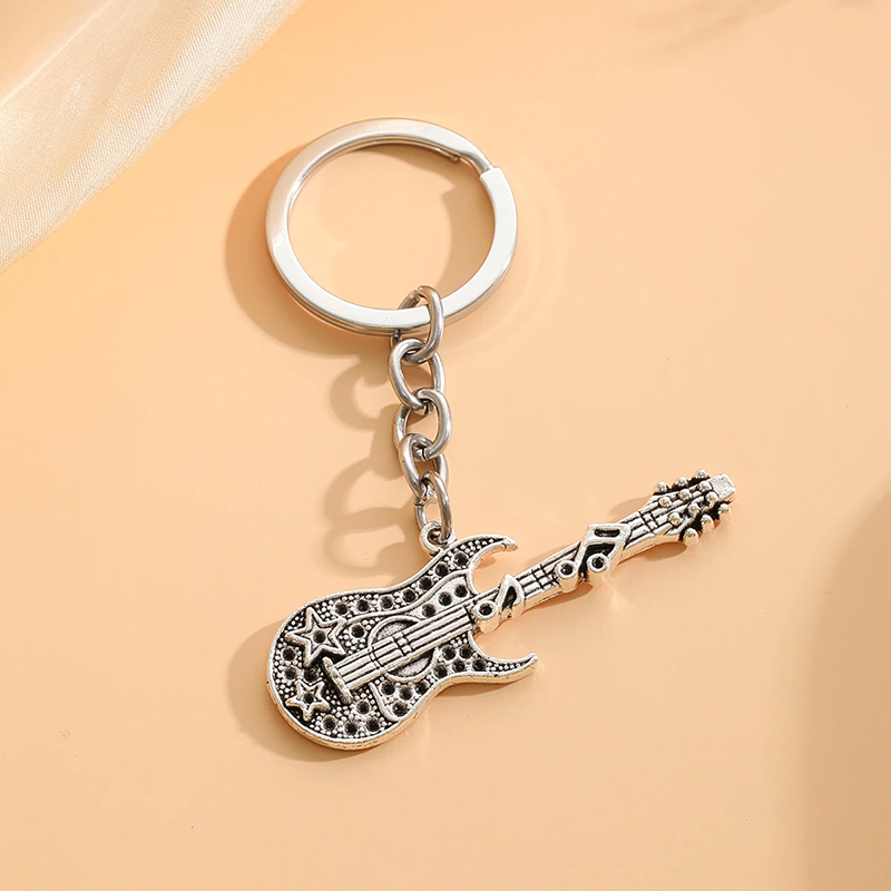 Vintage guitar keychain amulet model