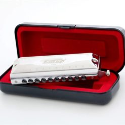 Details of a 10-hole steel chromatic harmonica