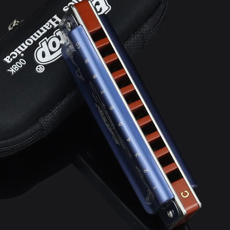 Details of a metallic blue diatonic harmonica with 7 tunings