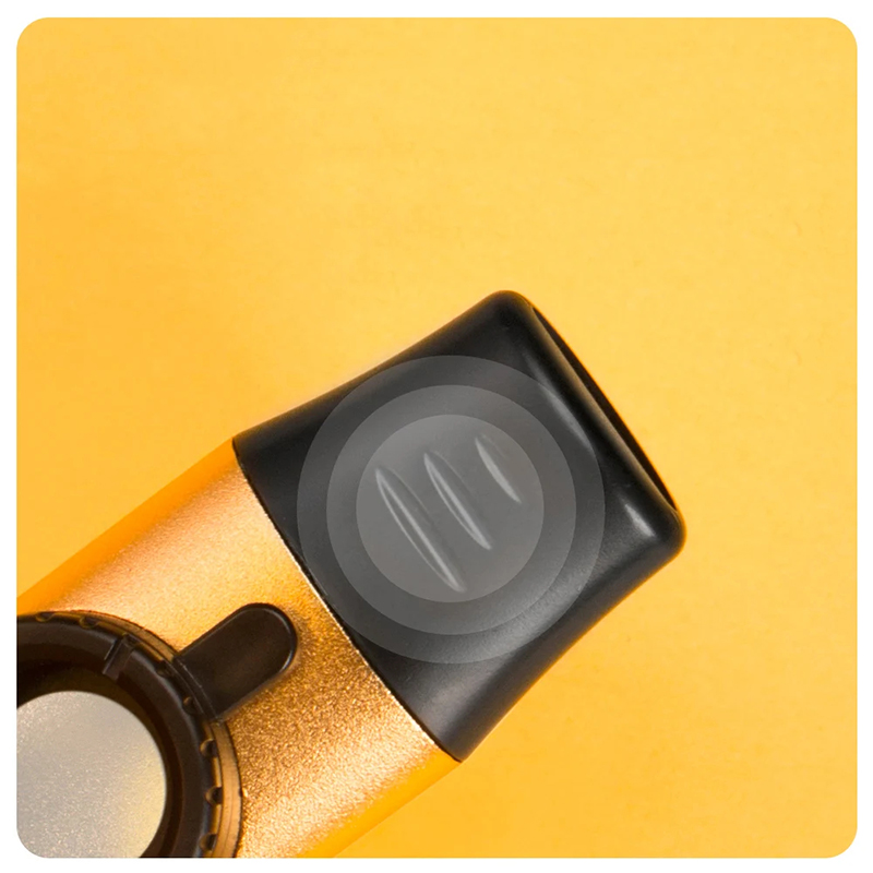 Details of the right peak of a 5-colored metal Kazoo.
