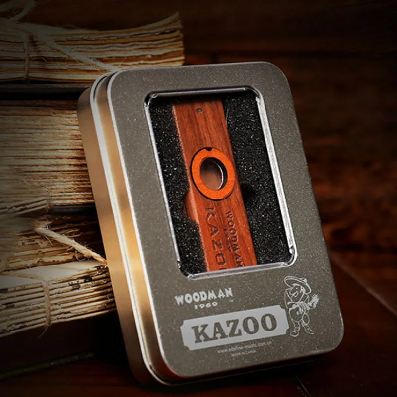 Details of a wooden Kazoo in a metal case