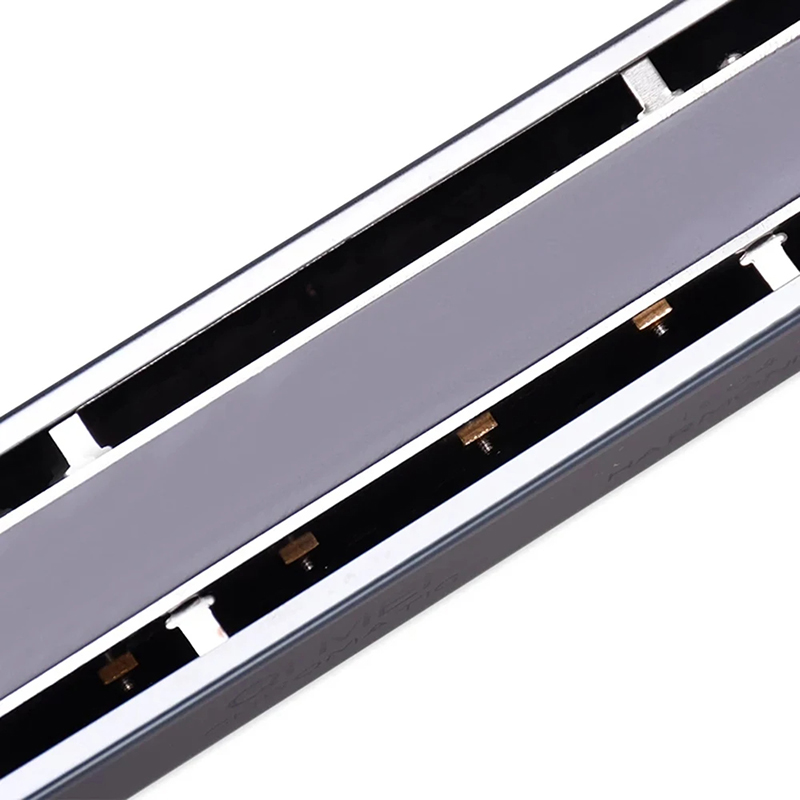 Detailed features of a 16-hole chromatic harmonica - model