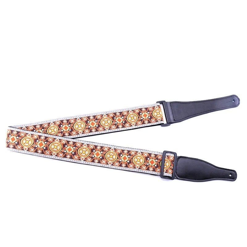 Details of an acoustic guitar strap with floral motif in embroidered cotton
