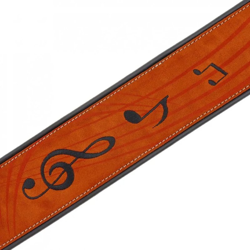 Details of a Beige Suede Guitar Strap with Music Notes Pattern