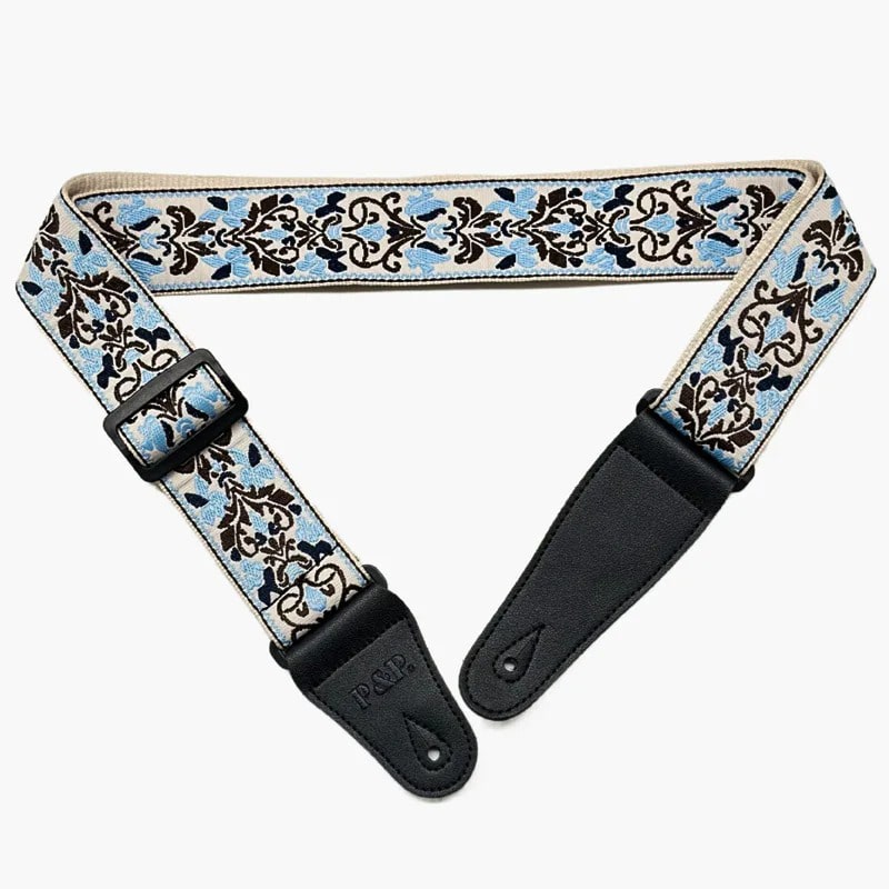 Guitar strap with blue and brown floral pattern