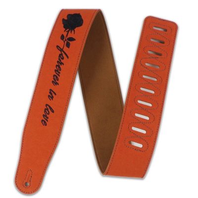 Details of a leather guitar strap for rockers with the inscription Forever in Love