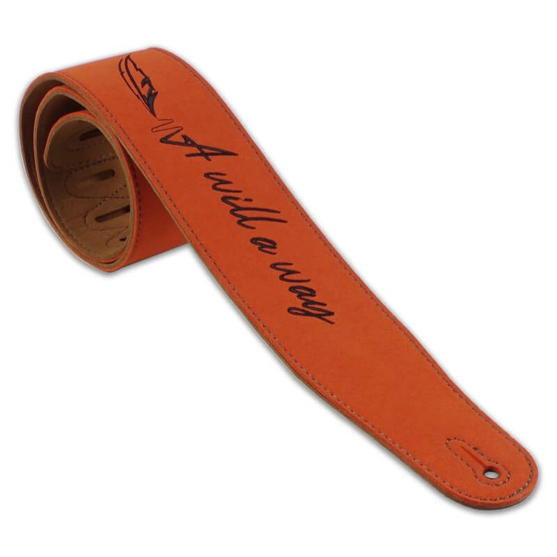 Details of a leather guitar strap for rockers with the inscription "A Will A Way".