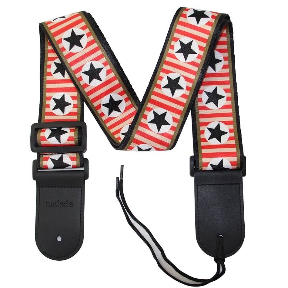 Full view of electric guitar strap with rock stars
