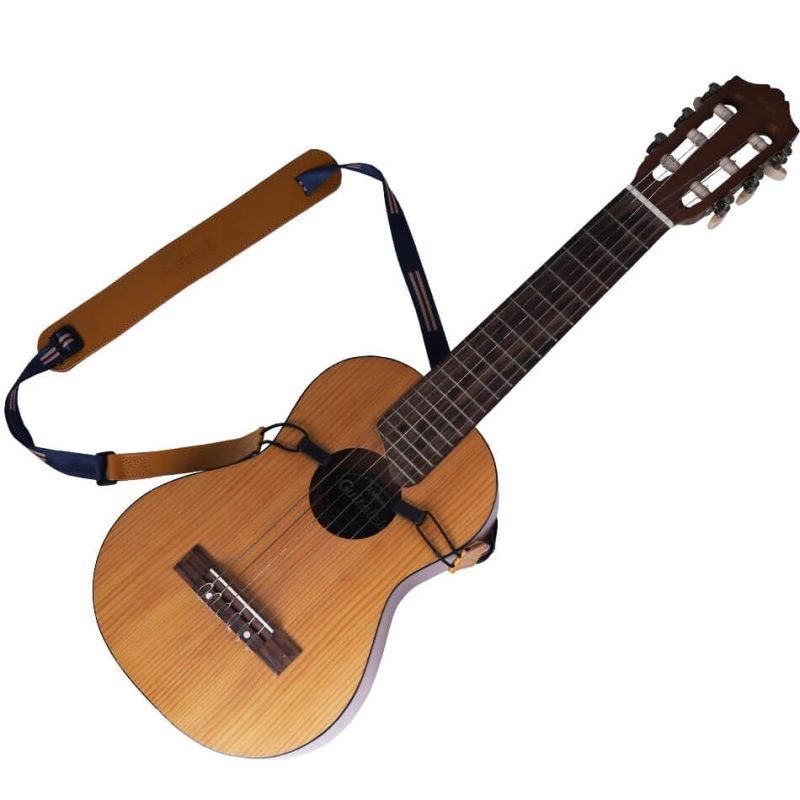 Detailed view of a very thin ukulele strap with shoulder pad