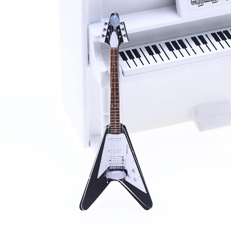 Miniature electric guitar of the Flying V type - model 1