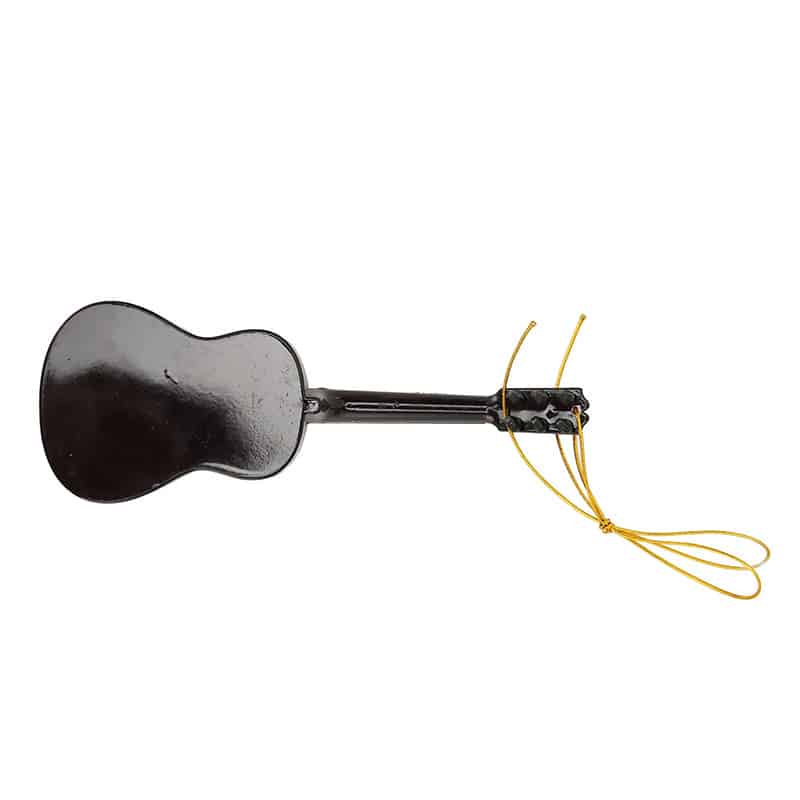 Detailed view of a realistic wooden miniature acoustic guitar for hanging