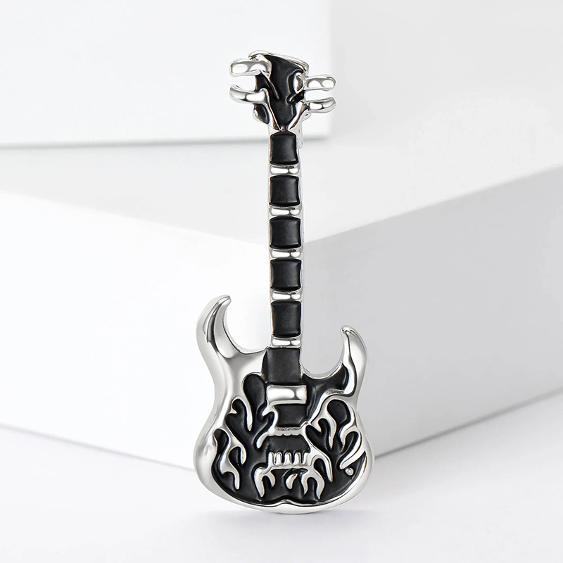 Silver-colored heavy metal guitar pins