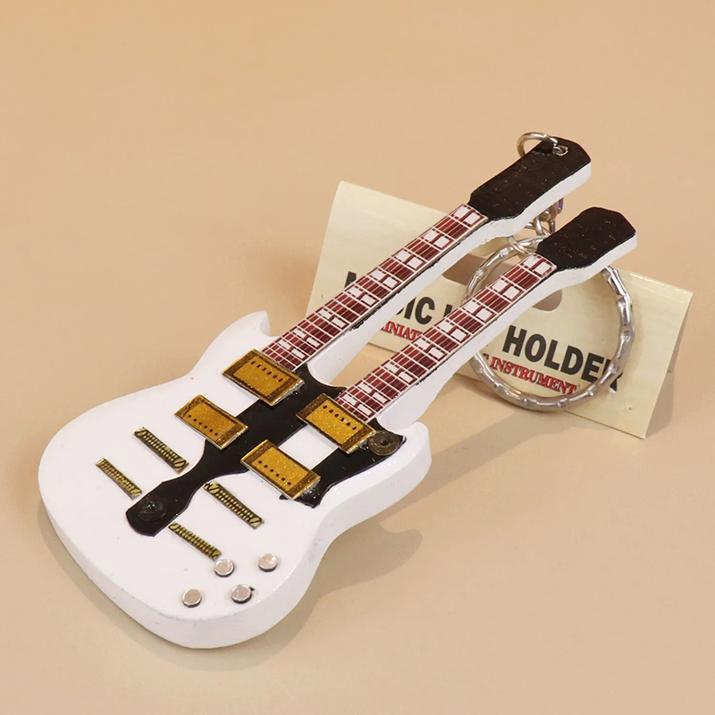 Double-necked white electric guitar keychain