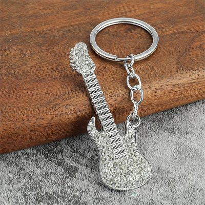 Electric guitar keychain with rhinestones, available in 6 colors - white color
