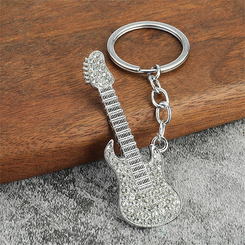 Electric guitar keychain with rhinestones, available in 6 colors - white color