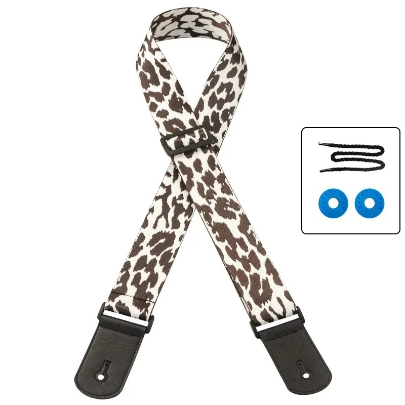 White guitar strap with animal print