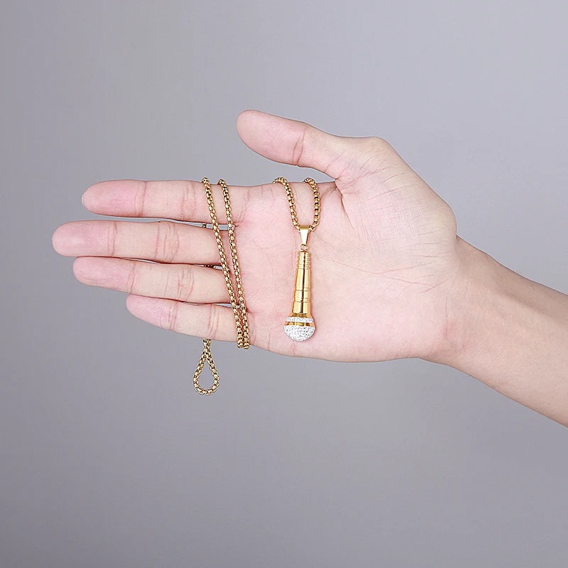 Details of the Rock Microphone Pendant Necklace in gold color