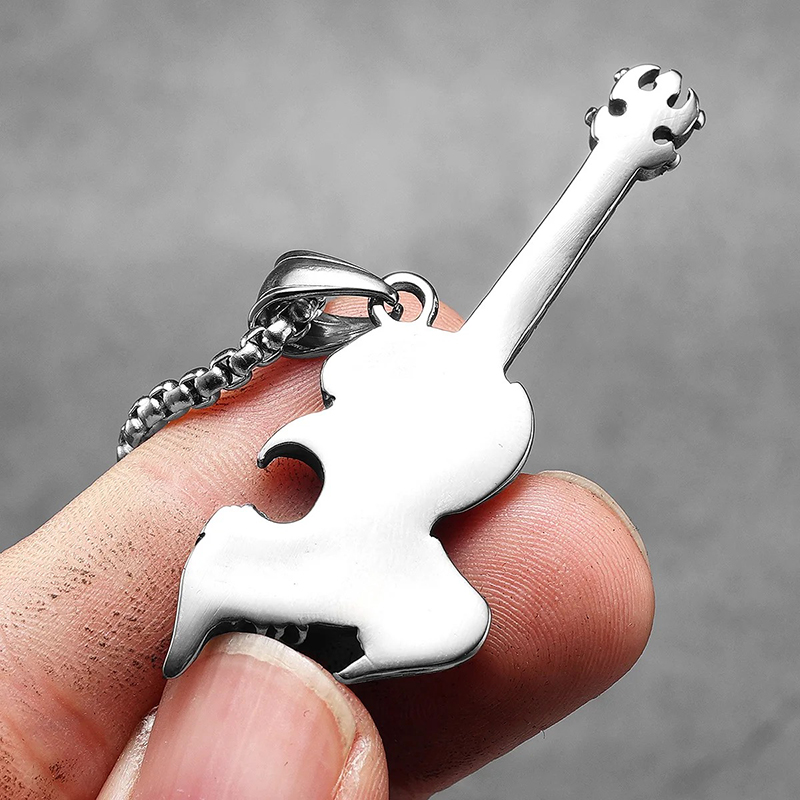 Backside of the heavy metal rock guitar pendant with a snake.