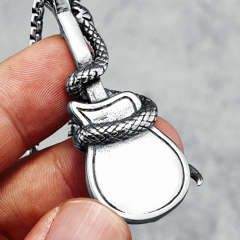 Back view of the heavy metal rock guitar pendant with a guitar wrapped by a snake.