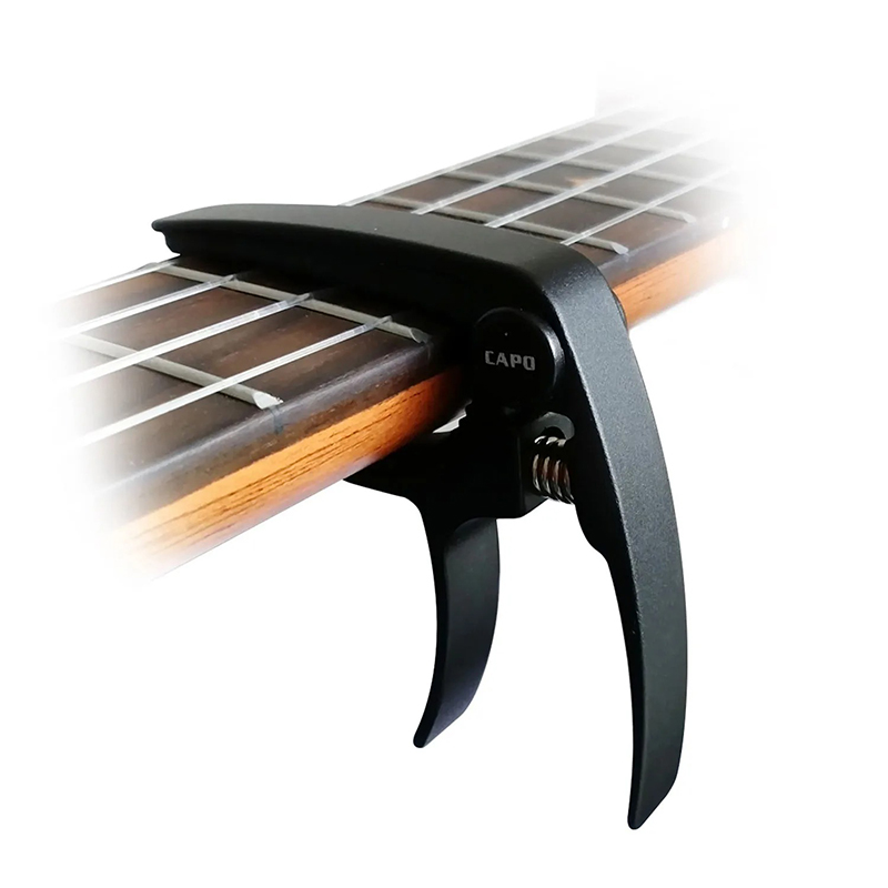 Detailed view of an aluminum alloy ukulele capo.