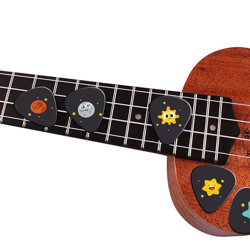 Details of the designs of a set of 10 picks with Space, Planet, and Stars motifs for children