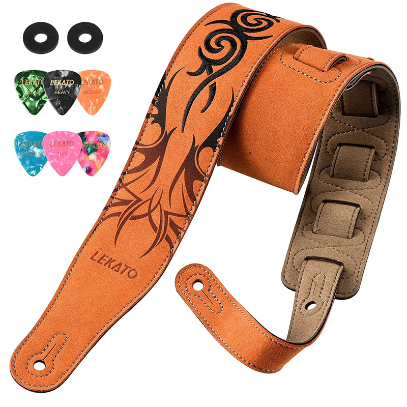 Details of the suede leather guitar strap with tribal pattern embroidery