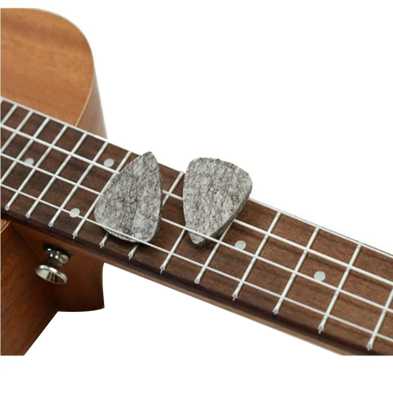 Set of 5 soft felt picks in various colors for gray ukulele