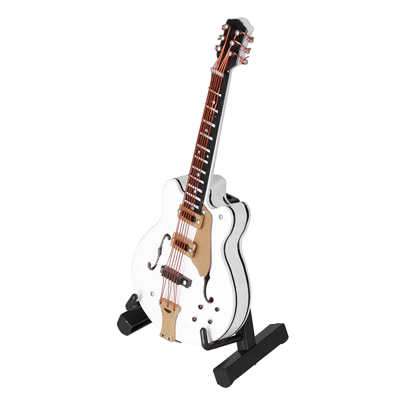 Miniature white Gibson-style electric guitar