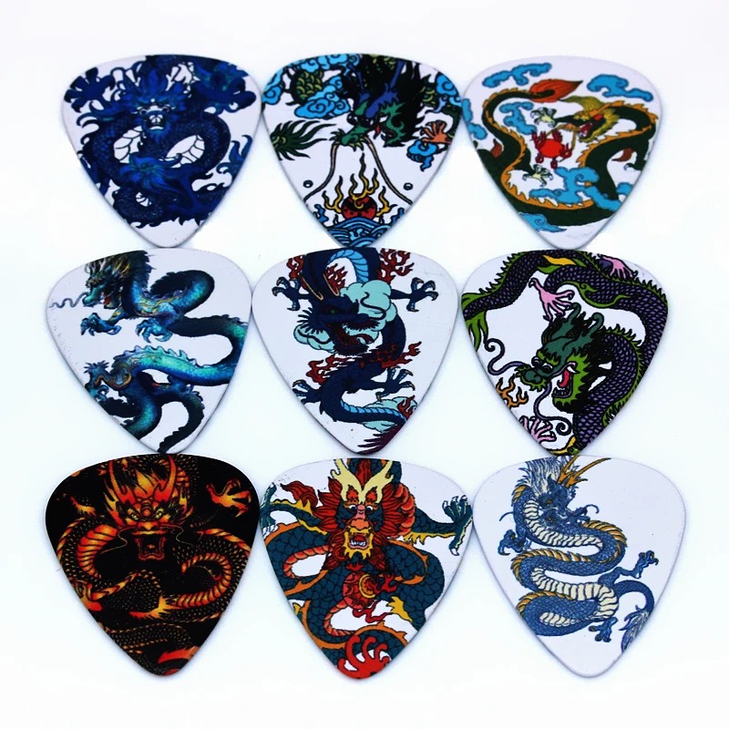 Details of the Lot of 10 Picks with Dragon Motifs