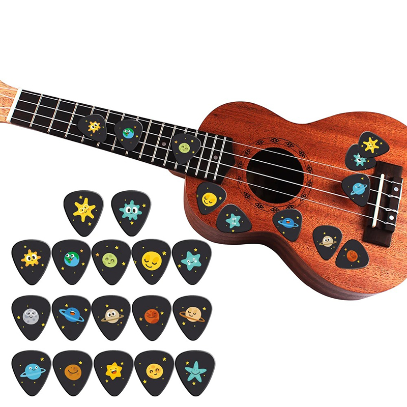 Set of 10 guitar picks with Space, Planet, and Star designs for kids
