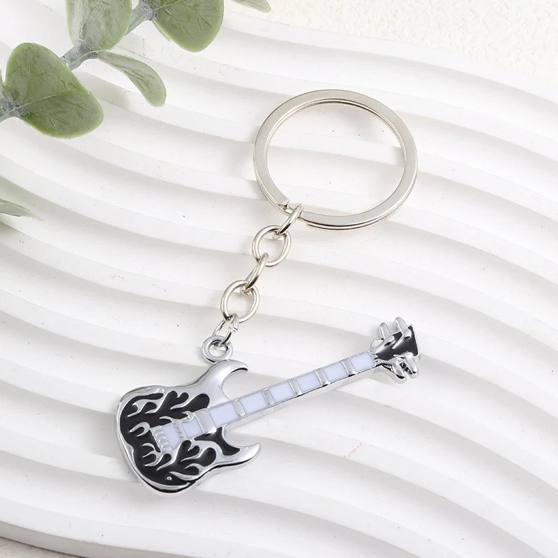 Magnificent Heavy Metal guitar keychain with flames