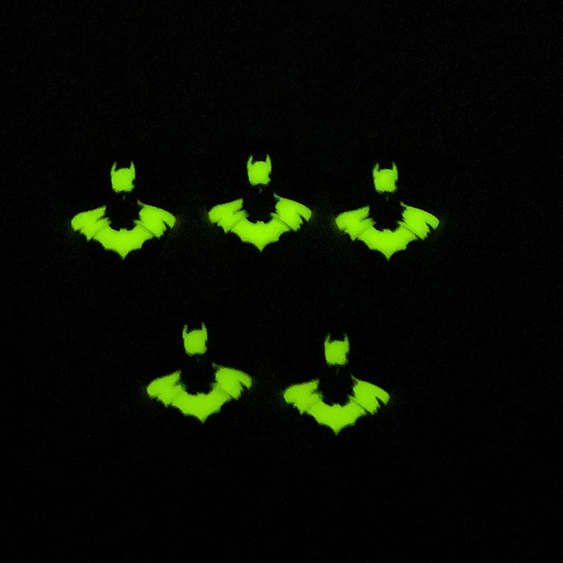 Luminescent view of guitar picks with a bat motif