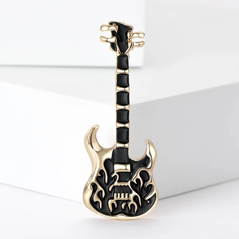 Gold-colored heavy metal guitar pins