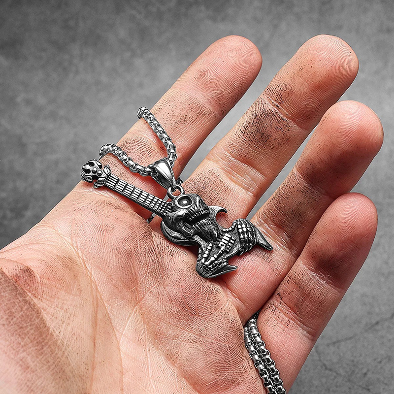 Detailed view of the Heavy Metal Rock Guitar Pendant with Snake