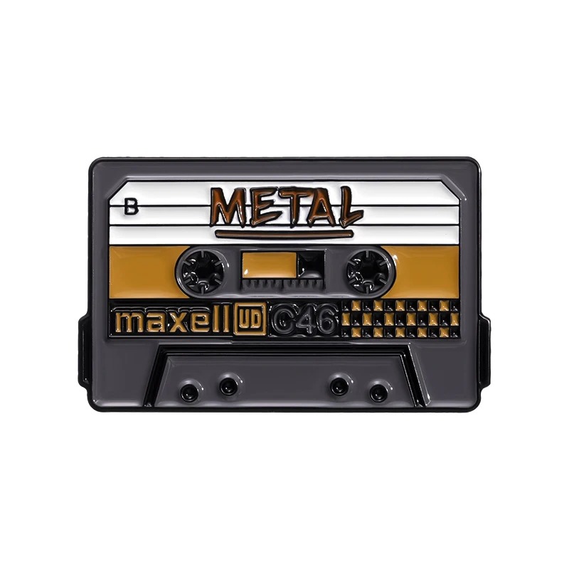 Colorful enamel pins with a Retro Cassette design and the inscription METAL.