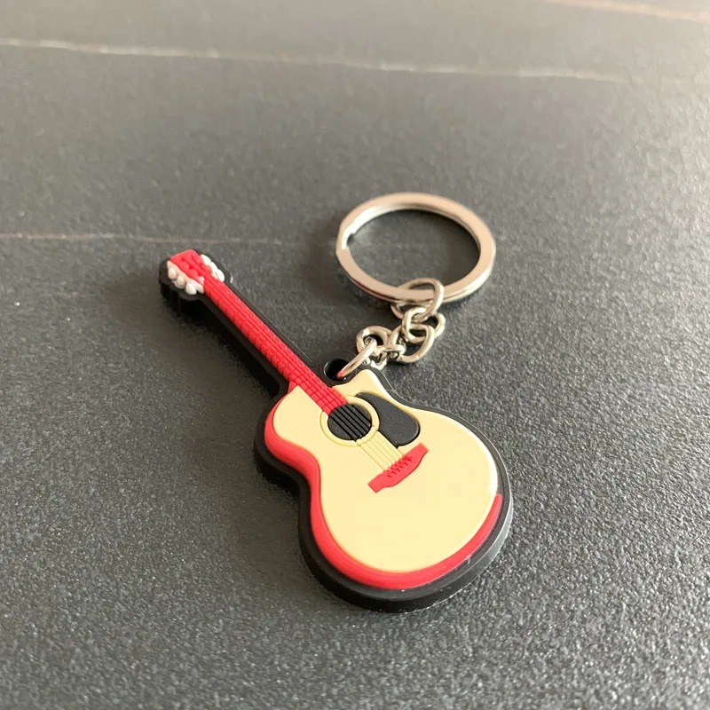 Soft rubber acoustic guitar keychain