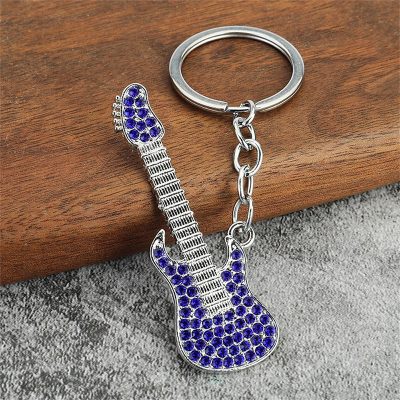 Electric guitar keychain with rhinestones in 6 colors to choose from - purple color