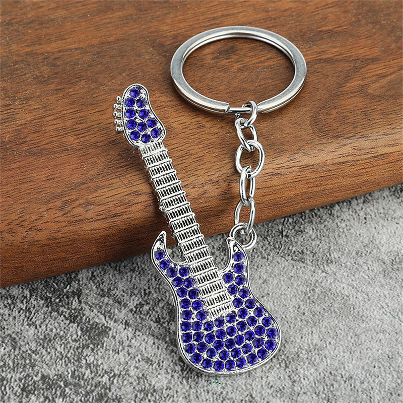 Electric guitar keychain with rhinestones in 6 colors to choose from - purple color