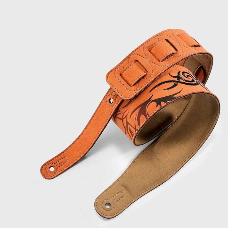 Full view of the suede leather guitar strap with tribal pattern embroidery.